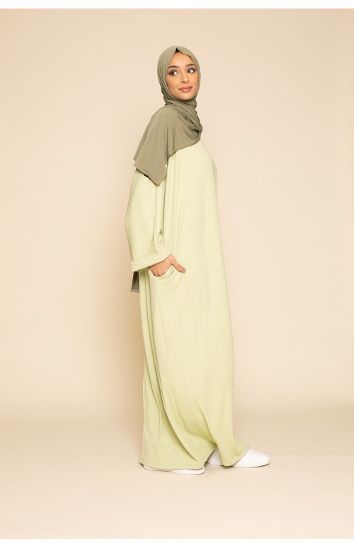 Abaya oversize vert anis pour jeune musulmane moderne