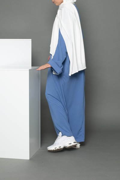 Oversized abaya for young girl in blue jeans