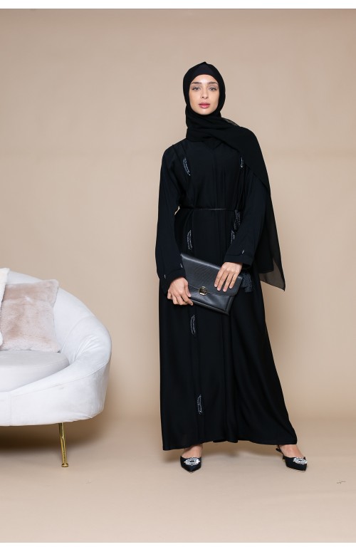 Abaya Dubai noir chic et moderne pour femme modeste. Boutique robe Dubai musulmane.