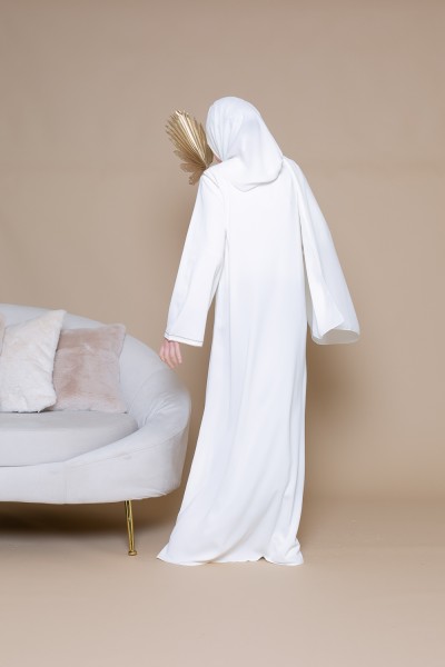 Young girl's off-white kaftan dress