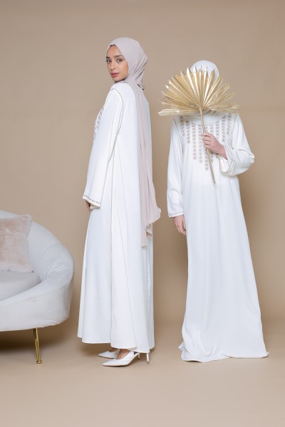 Young girl's off-white kaftan dress