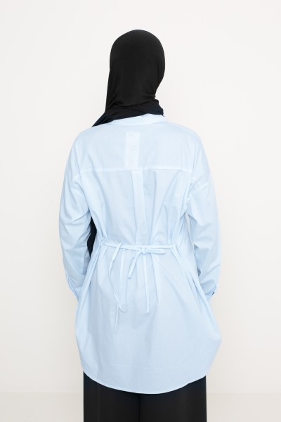 Camisa azul de la ciudad